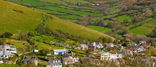 Green mountains and a village at the foot of the mountain