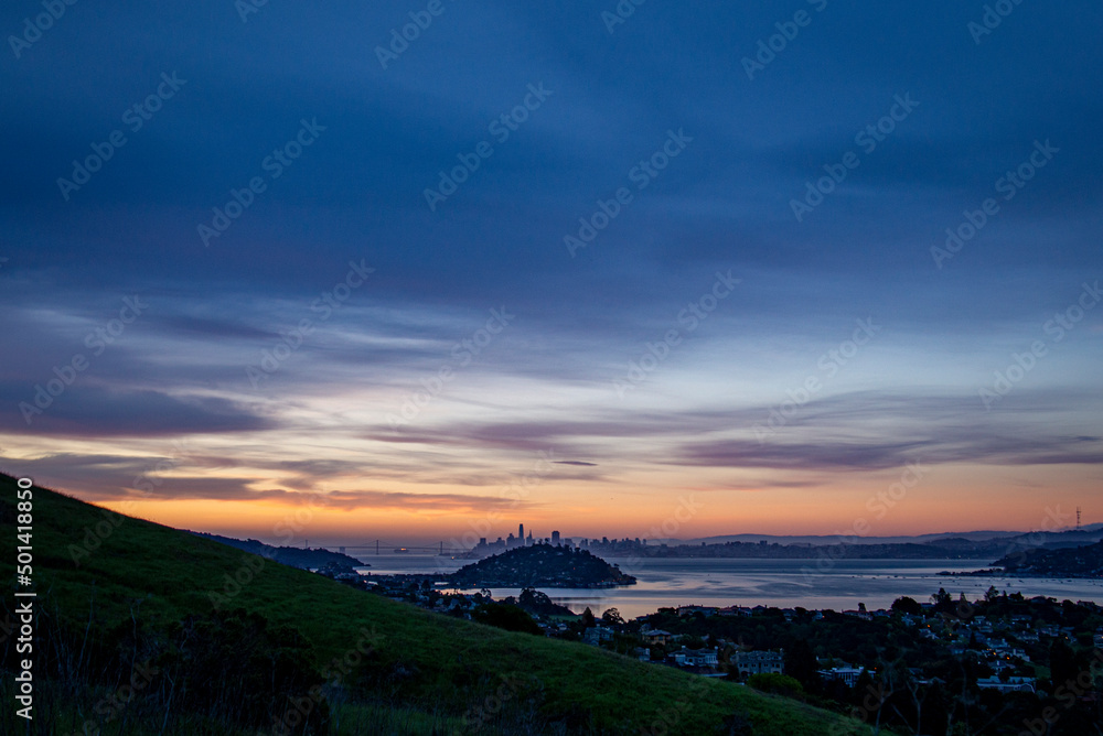 Morning Silhouette of San Francisco Skyline from Marin County, Blue Pink Orange Sky with city in distance across the San Francisco Bay