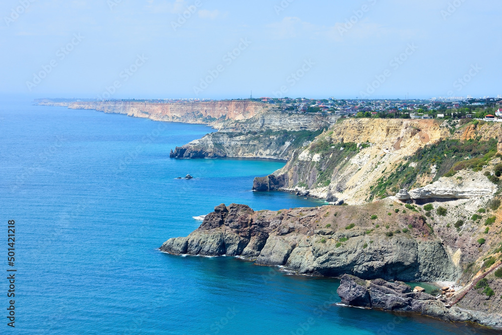 Azure water, wild beach, beautiful rocks and bay near Grape cape. Cape Fiolent, Sevastopol, Crimea