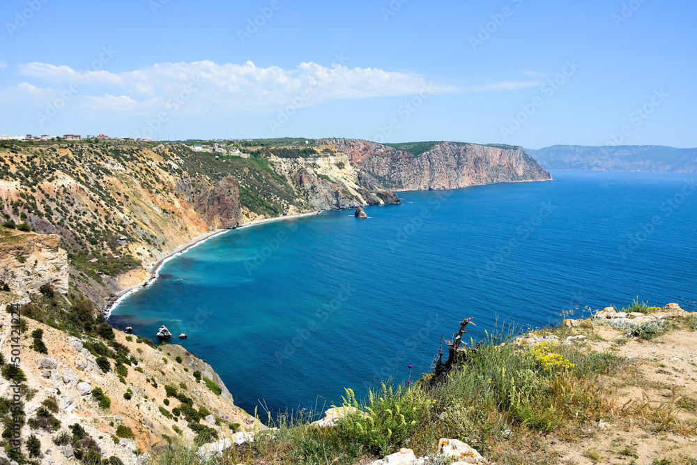Azure water, wild beach, beautiful rocks and bay near Grape cape. Cape Fiolent, Sevastopol, Crimea Azure water, wild beach, beautiful rocks and bay near Grape cape. Cape Fiolent, Sevastopol, Crimea