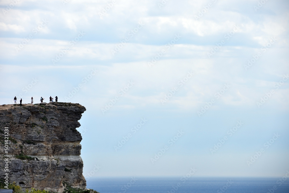 Peoples on the edge of the Cape Fiolent, Sevastopol, Crimea Peoples on the edge of the Cape Fiolent, Sevastopol, Crimea