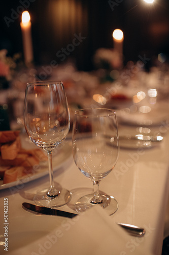 shining glasses in the wedding festive table setting side view