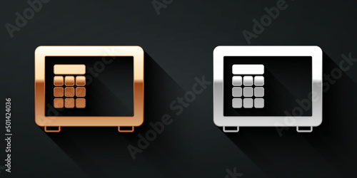 Gold and silver Safe icon isolated on black background. The door safe a bank vault with a combination lock. Reliable Data Protection. Long shadow style. Vector