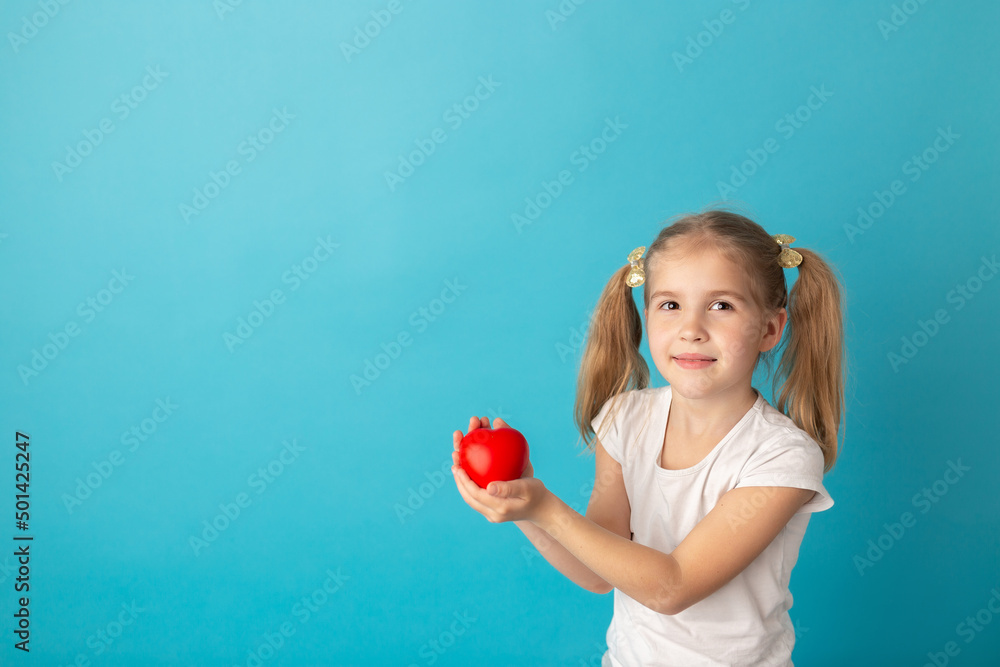 Sweet girl holding red heart. Valentines day or healthcare, medical concept. Peace on the world. No war, stop war Sweet girl holding red heart. Valentines day or healthcare, medical concept. Peace on the world. No war, stop war