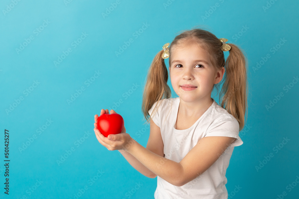 Sweet girl holding red heart. Valentines day or healthcare, medical concept. Peace on the world. No war, stop war Sweet girl holding red heart. Valentines day or healthcare, medical concept. Peace on the world. No war, stop war