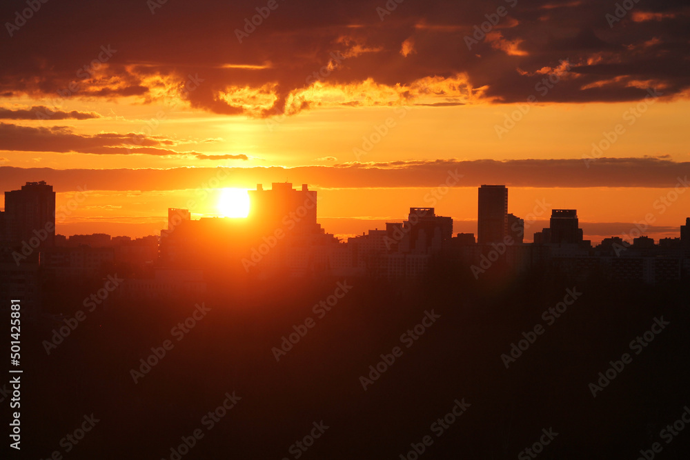 Cityscape with silhouette of city skyline against setting sun. Minsk, Belarus Cityscape with silhouette of city skyline against setting sun. Minsk, Belarus