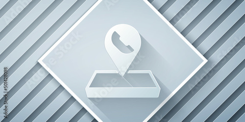 Paper cut Map pointer with telephone or communication icon isolated on grey background. Call center location. Paper art style. Vector