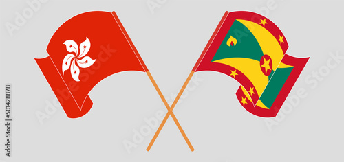 Crossed and waving flags of Hong Kong and Grenada