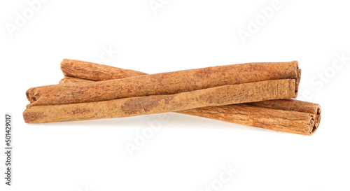 two cinnamon sticks isolated on white background