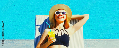 Photography Summer vacation, happy relaxing young woman lying on deckchair with cup of juice