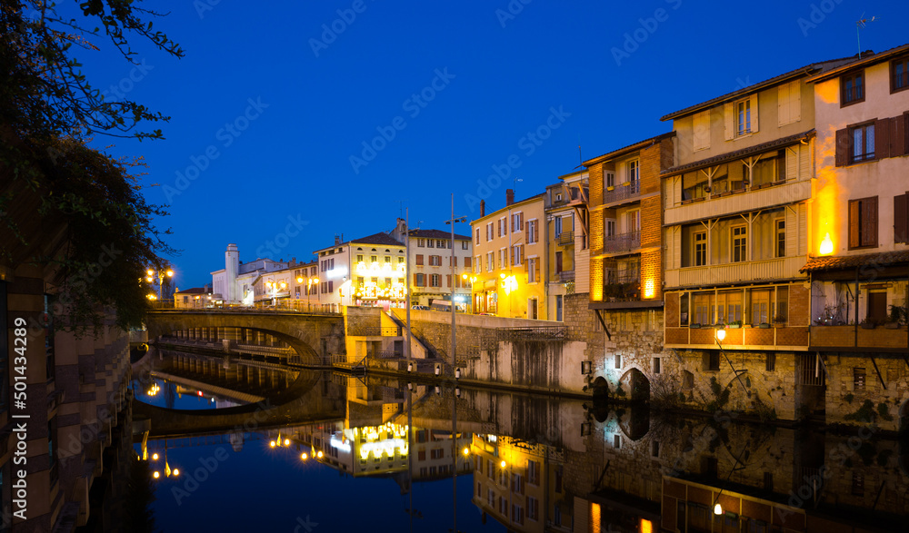 Scenic twilight view of houses of Castres city on Agout river in Occitanie, France