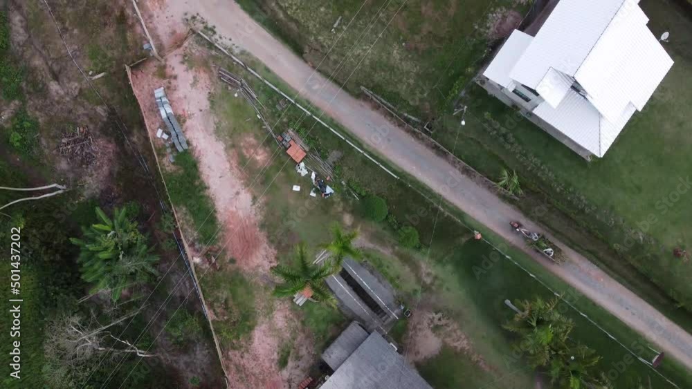 Country town in a valley with dirt streets and plantation greenhouses - Pedra Azul, Espirito Santo, Brazil