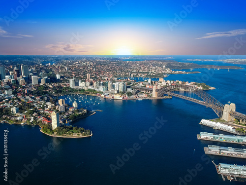 Fototapeta Naklejka Na Ścianę i Meble -  Sydney Harbour Australia with nice colours in the sky. Nice blue water of the Harbour, high rise offices and residential buildings of the City in the background, NSW Australia