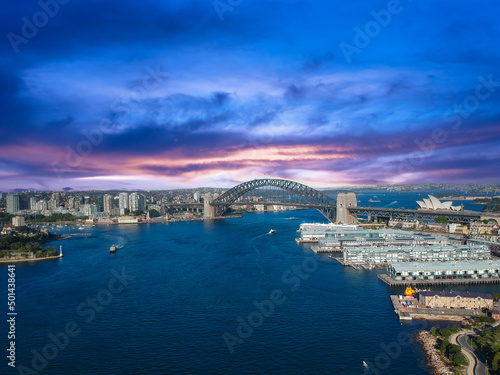 Sydney Harbour Australia with nice colours in the sky. Nice blue water of the Harbour, high rise offices and residential buildings of the City in the background, NSW Australia