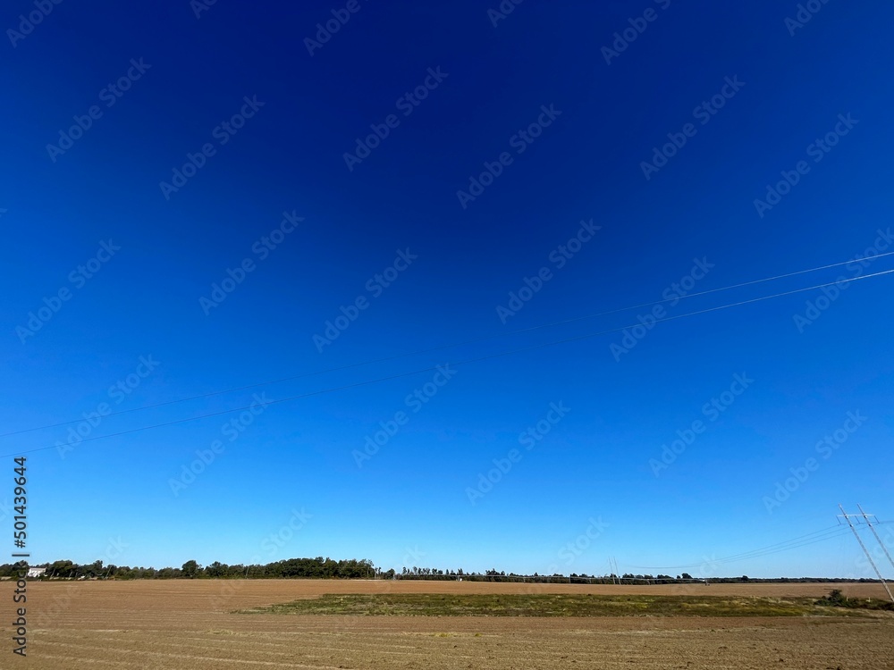 Fototapeta premium Fields Nature and clear blue sky wide view