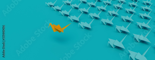 Yellow Origami Bird Leading the Group. Clean Manager Concept on Turquoise Background with Copy Space. photo