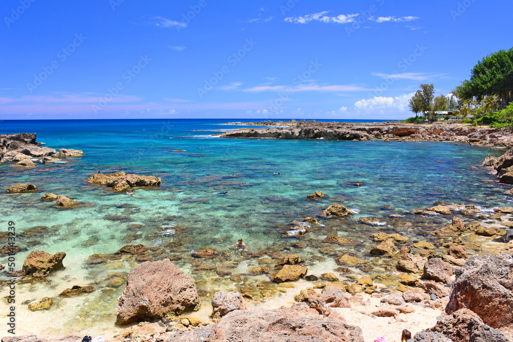 Sharks Cove on a sunny summer day on the Northshore of the island of Oahu in Hawaii. Sharks Cove on a sunny summer day on the Northshore of the island of Oahu in Hawaii.