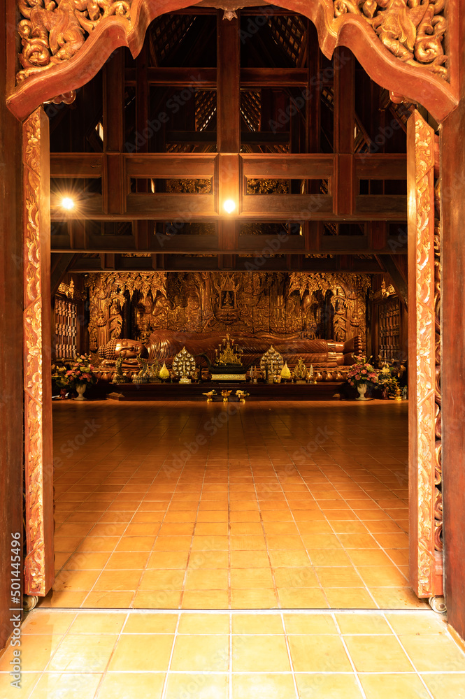 The Wooden Reclining Buddha of Wat Luang Khun Win in Chiangmai Province The Wooden Reclining Buddha of Wat Luang Khun Win in Chiangmai Province