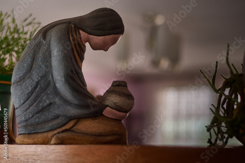 Biblical woman offering a pitcher of water photo