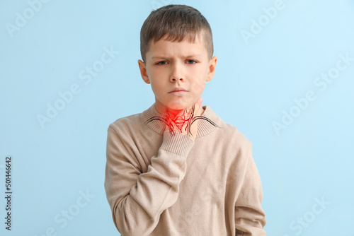 Ill little boy with pain in...