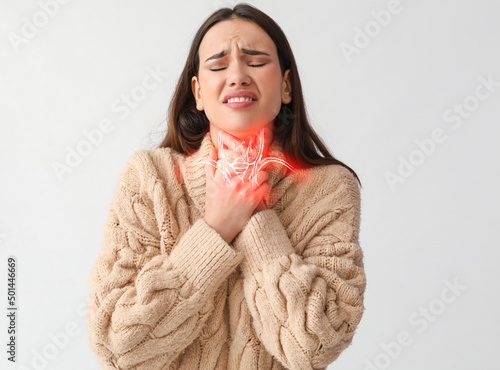 Ill young woman with pain i...
