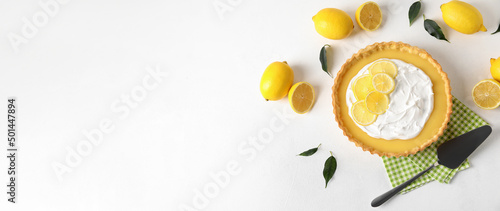 Delicious lemon tart on light background with space for text