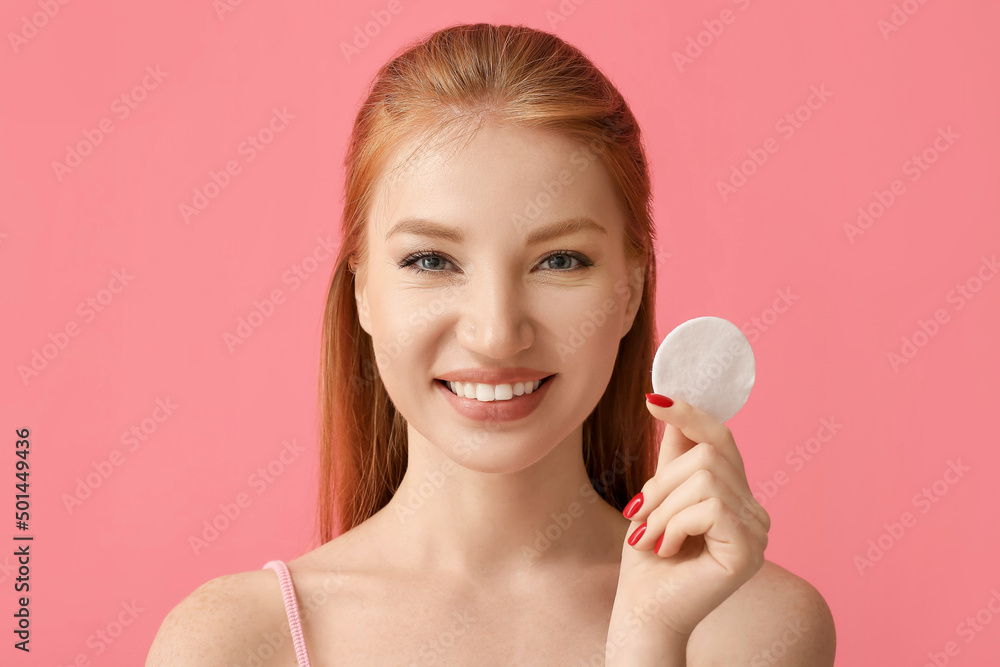 Beautiful woman with makeup sponge on color background Beautiful woman with makeup sponge on color background