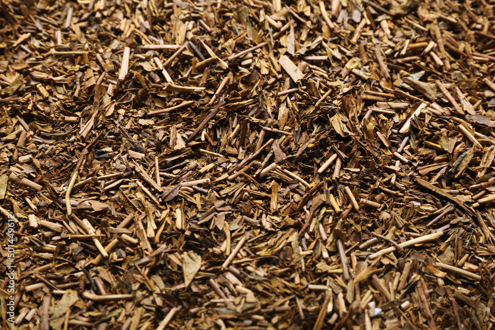 Heap of hojicha green tea as background, closeup Heap of hojicha green tea as background, closeup