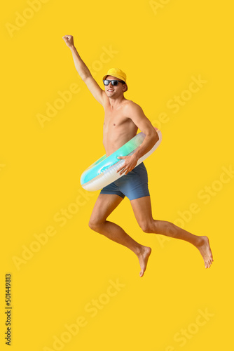 Jumping young man with infl...