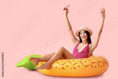 Happy young woman with infl...