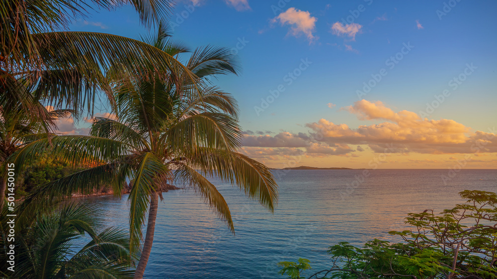 Tropical Island ocean view at sunset