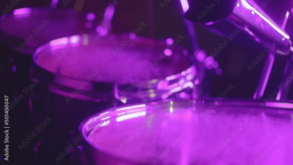 Talented Drummer Hitting His Drum At A Gig - close up