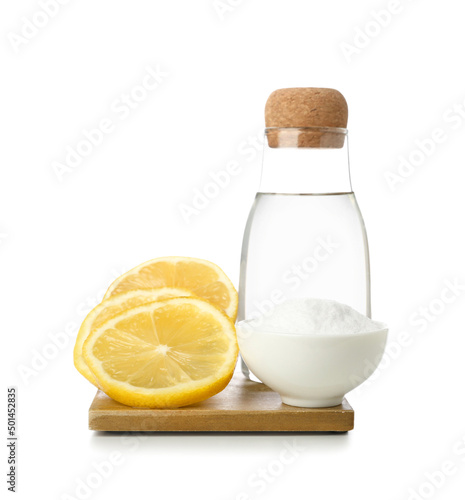 Bowl with baking soda, bott...