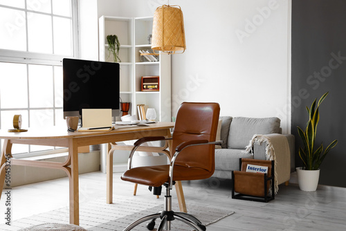 Workplace with modern compu...