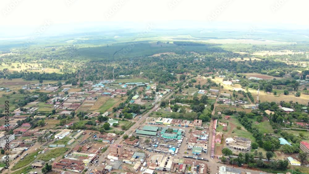 Aerial drone view Open Air market in the Loitokitok town, Kenya and mount Kilimanjaro- Rural village of Kenya. Rural settlement Kenya Aerial drone view Open Air market in the Loitokitok town, Kenya and mount Kilimanjaro- Rural village of Kenya. Rural settlement Kenya