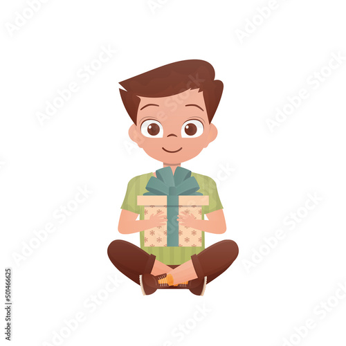A little boy teenager sits in a lotus position and holds a gift box in his hands. Birthday, New Year or holidays theme. Isolated. Cartoon style.