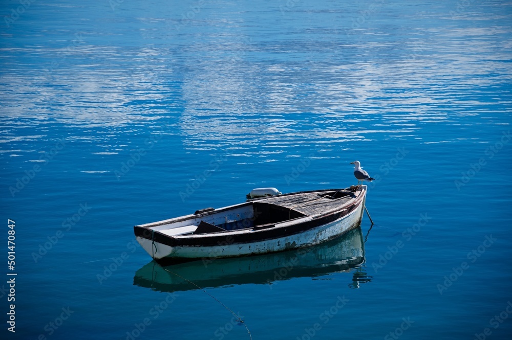 High angle view of wooden boat on the blue sea