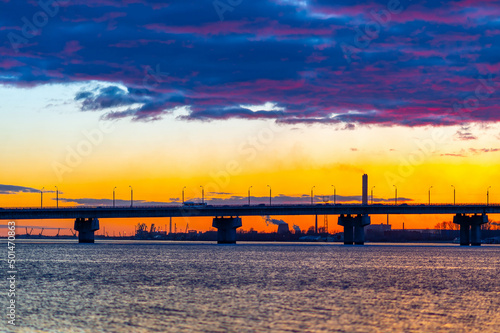 Skyline of Cherepovets Russia during sunset with Oktyabrsky bridge across the river © Евгений Панов