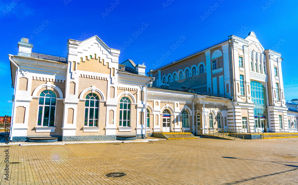 Railway station building in Cherepovets Russia a load taken in backlit and sun glare.