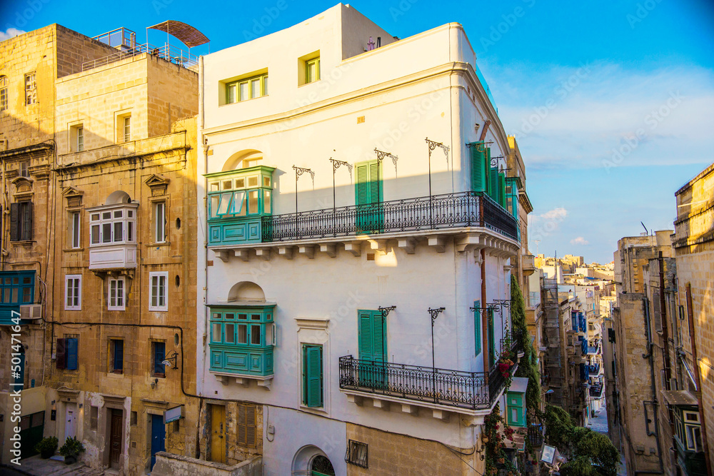 Traditional Maltese architecture. Old historical part of La Valetta with narrow streets and wooden balconies, La Valetta, Malta