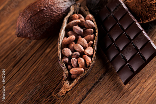 Chocolate bar, candy sweet, dessert food on wooden background