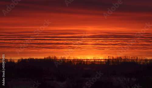 Blood red dawn landscape.