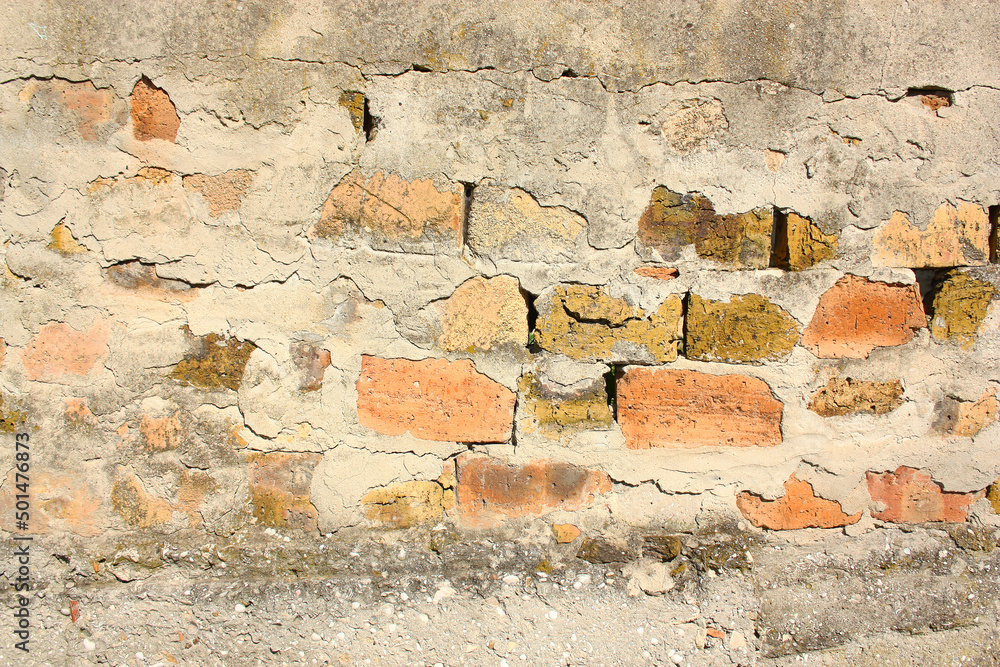 Brick wall with streaks of concrete. High quality photo Brick wall with streaks of concrete. High quality photo