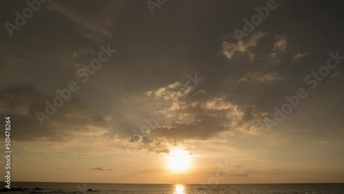 Timelapse. bueatifull Yellow sun down with cloundy at sunset photo