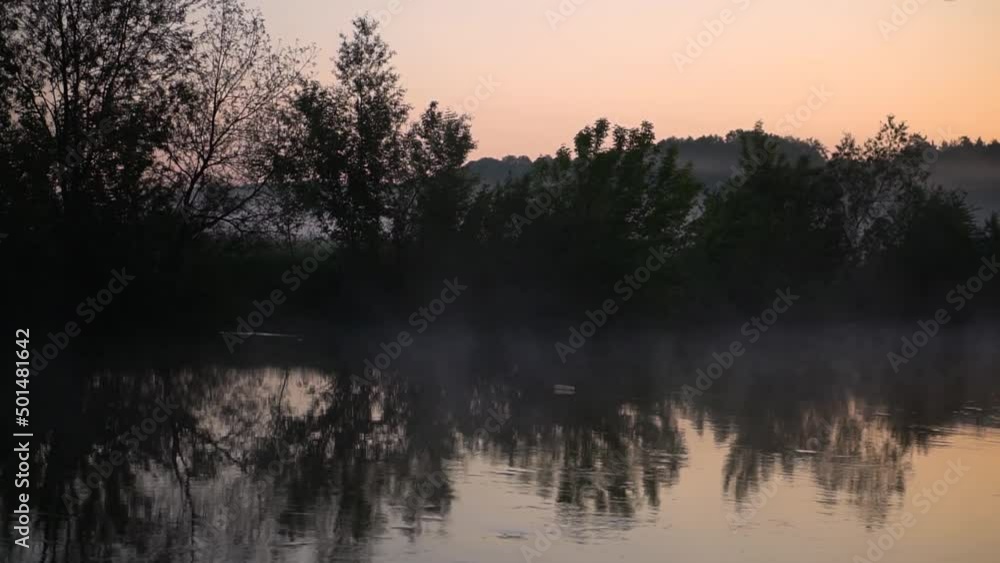 River in the morning in a beautiful fog. Beautiful lake in the evening, sunset against the backdrop of the sun River in the morning in a beautiful fog. Beautiful lake in the evening, sunset against the backdrop of the sun
