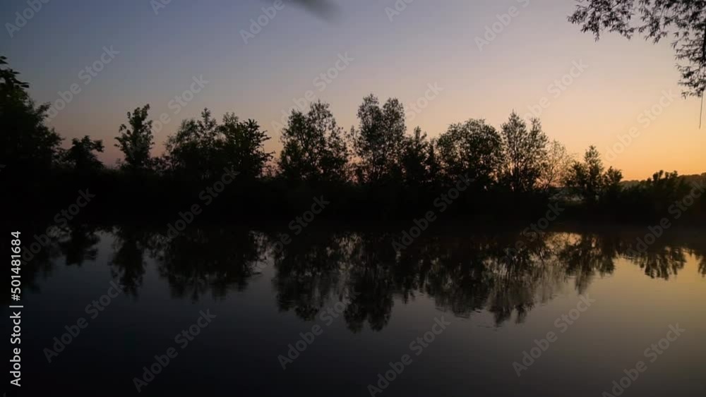 River in the morning in a beautiful fog. Beautiful lake in the evening, sunset against the backdrop of the sun River in the morning in a beautiful fog. Beautiful lake in the evening, sunset against the backdrop of the sun