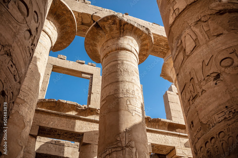 Different columns with hieroglyphs in Karnak temple. Karnak temple is the largest complex in ancient Egypt.