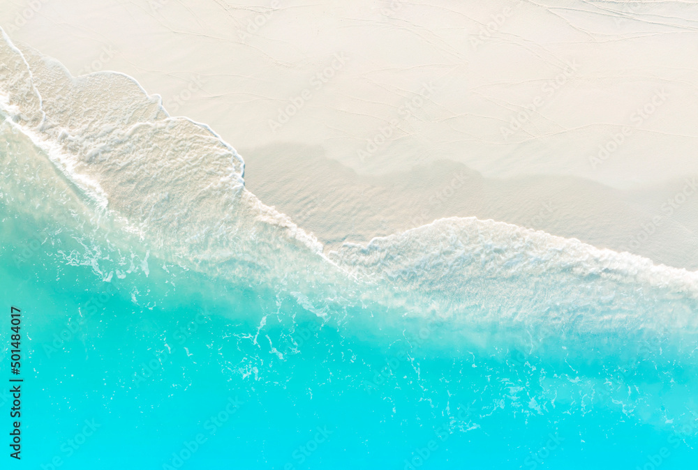 The aerial Top view of the tropical summer beach and water wave on the beach,top view image background