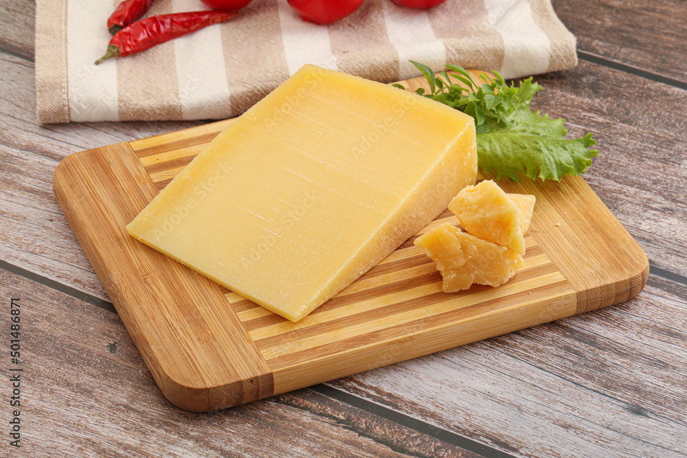 Parmesan hard cheese with small pieces Parmesan hard cheese with small pieces