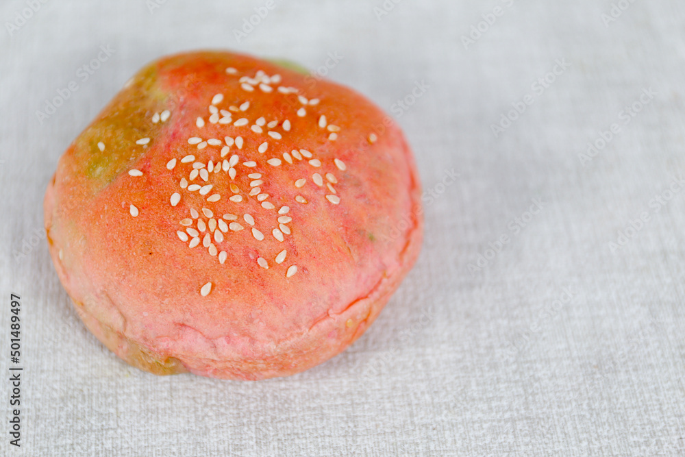 Rainbow burger buns with sesame set with copy space for text Rainbow burger buns with sesame set with copy space for text